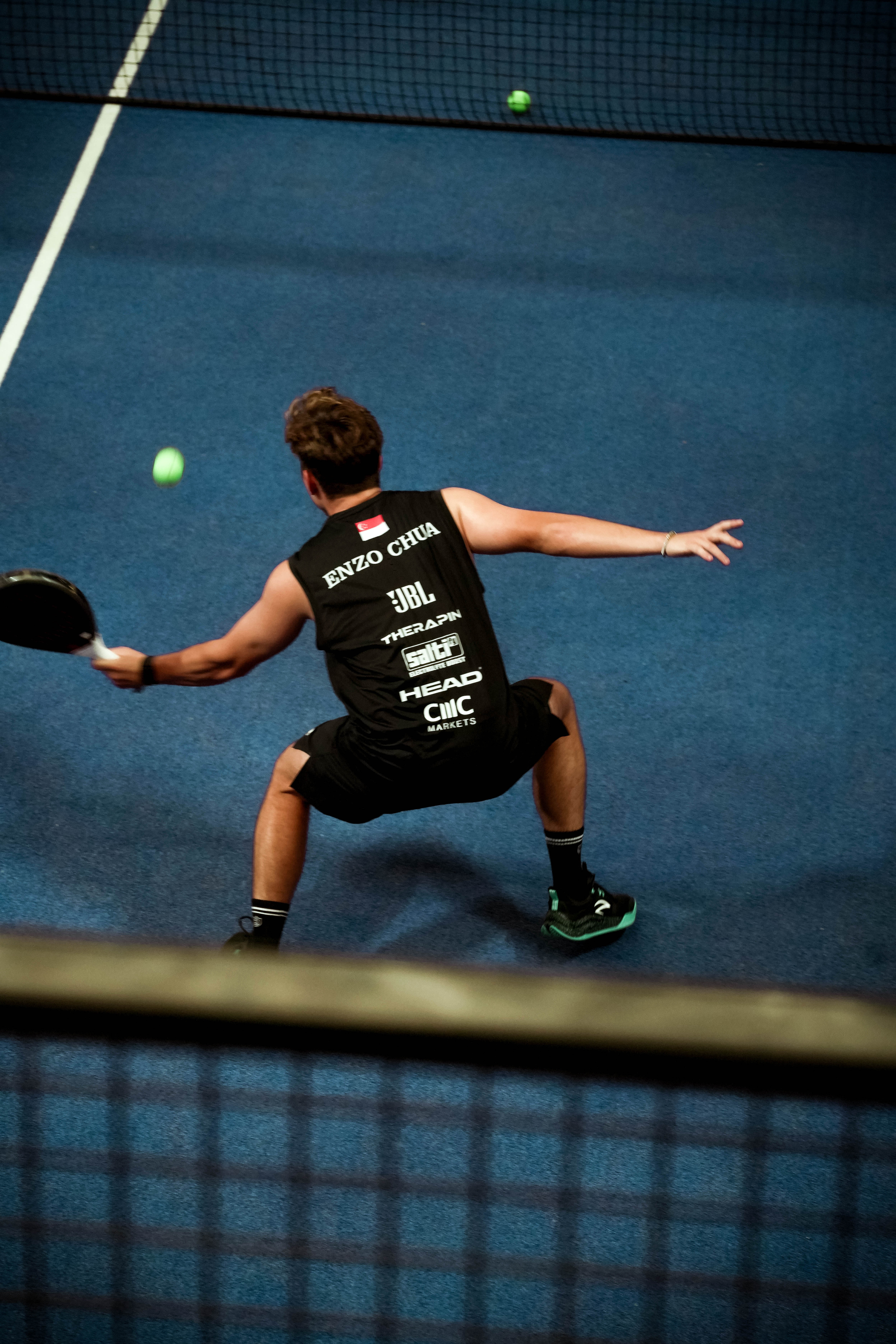Enzo Chua on the padel court — the geometry of the game.